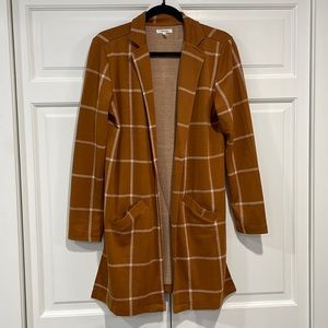 Maurice’s rust and white blazer